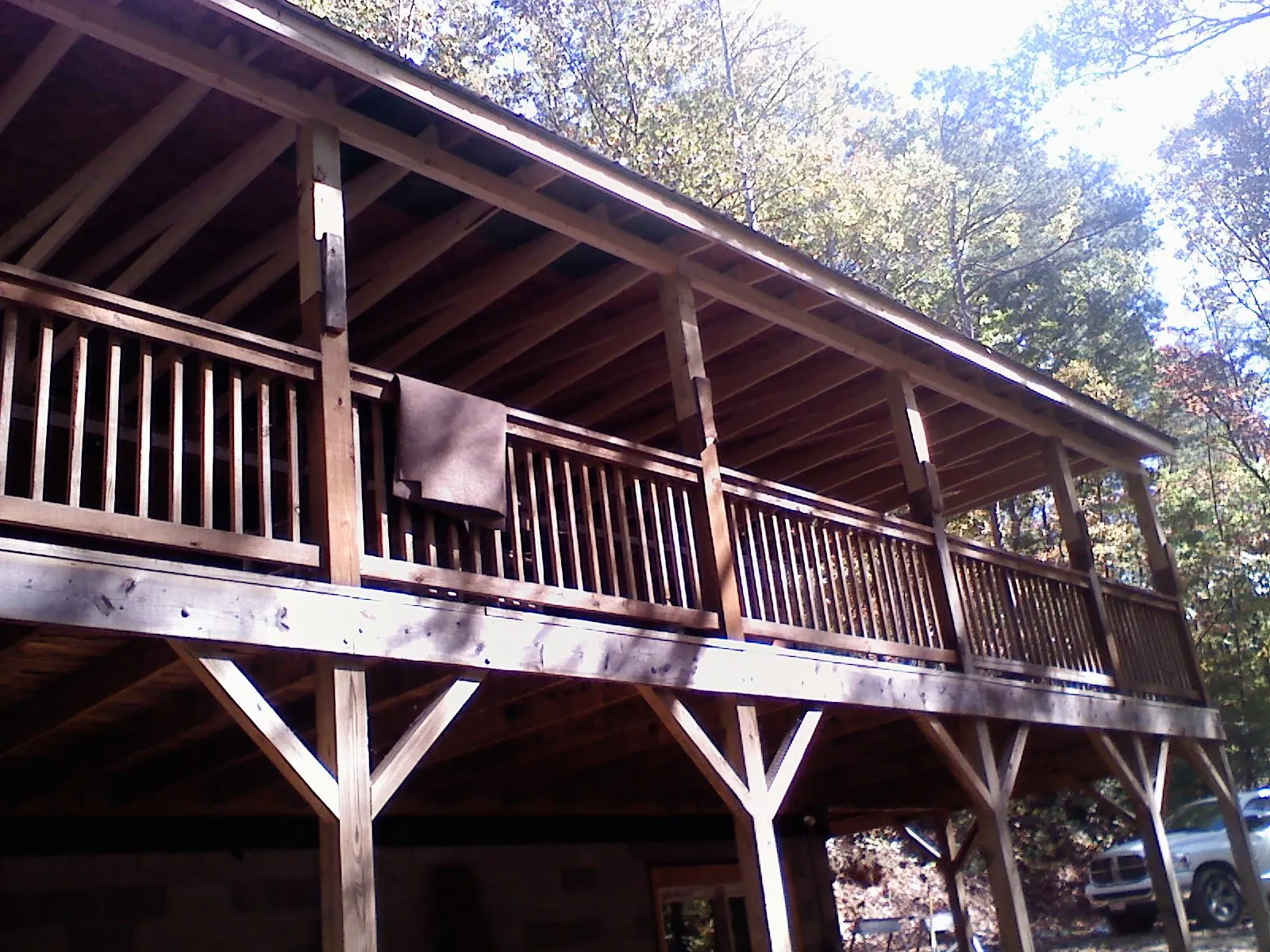 Timber framing under a new elevated porch and deck — Roof Leak Repair in Norman by Roofing Brothers